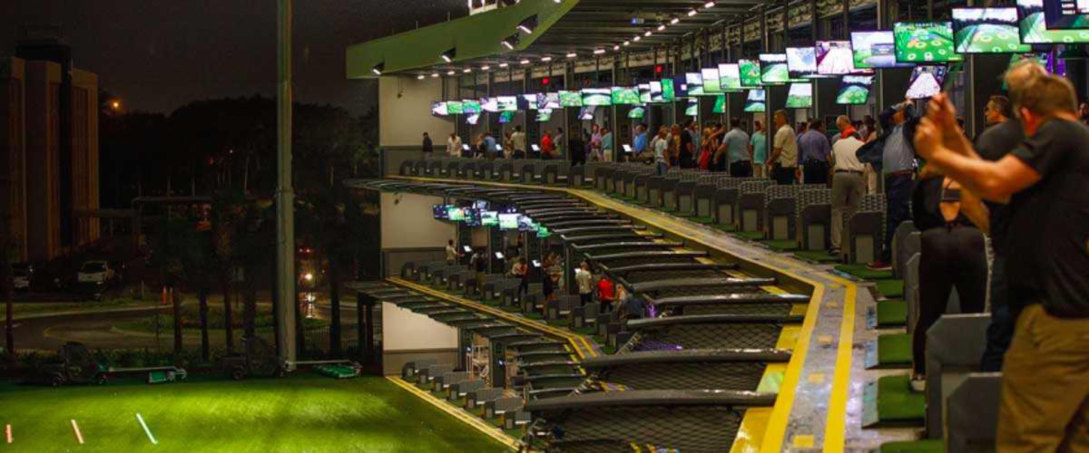 The Drive Shack model features multi-stacked hitting bays that accommodate up to six people and offer not only driving range games, but an assortment of food, drink and other "gamification." 